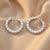 Aria Emerald-Cut Eternity Huggie Earrings